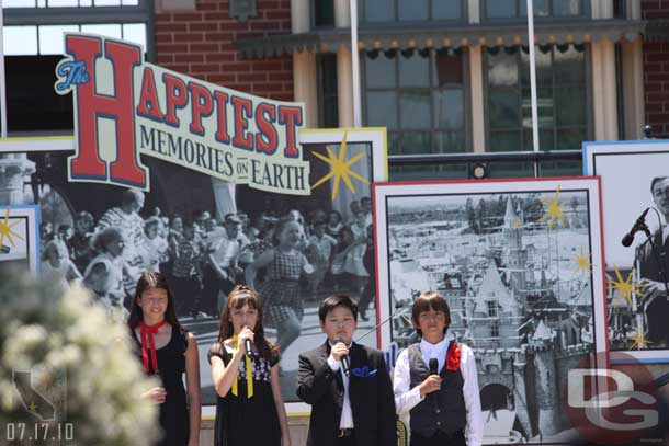 A group of children took the stage to sung When You Wish Upon a Star in English, Japanese, French, and Chinese.  