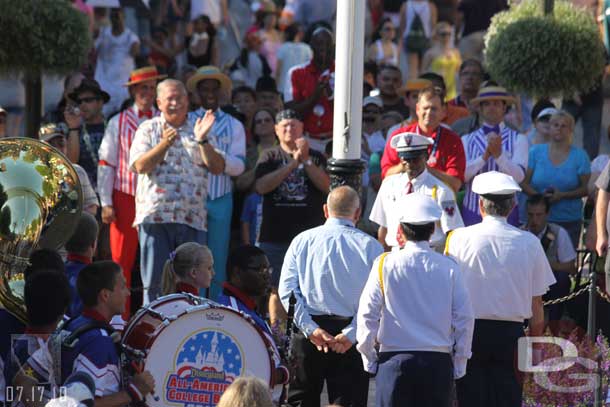 I could not hear (no mic) but it looked like the gentleman in the blue shirt was honored, my guess is he is retiring, they thanked him for his service to Disneyland.
