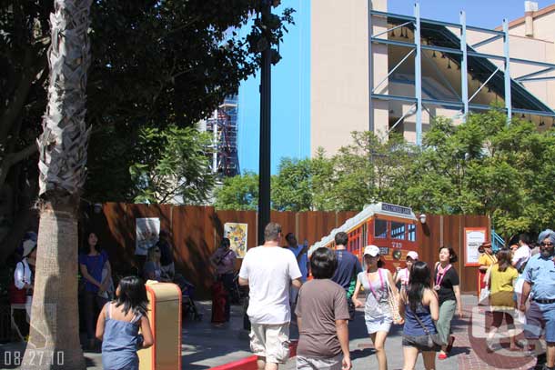 The wall for the red car extends almost to the courtyard by tower (remember where the rails ended).