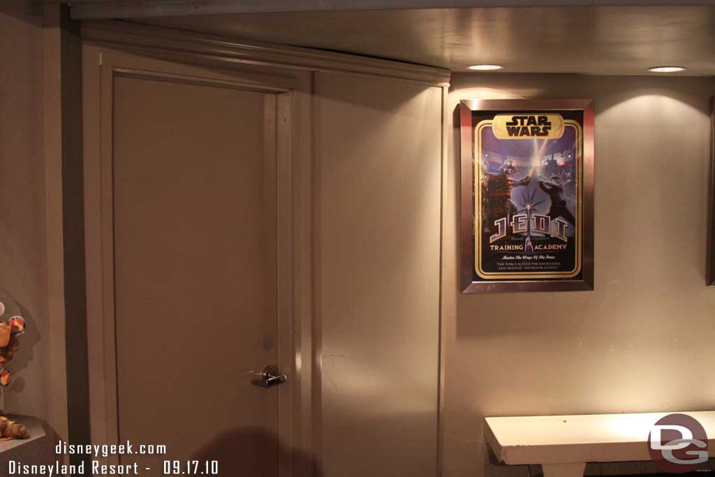 A plain wall/door blocking the exit to Star Tours.