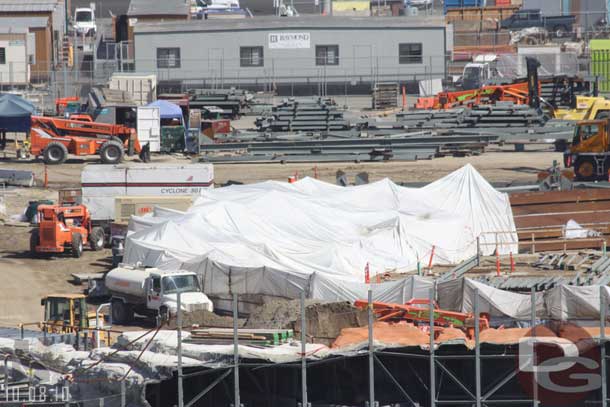 The track is covered for the racers, read they are applying the surface.