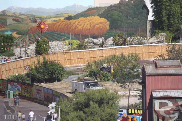 Only some trees and rubble remain in the farm area.