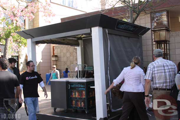 Setting up the face painting booth (looks like they reused some of the Glow Fest structures, just a new graphics package on them)