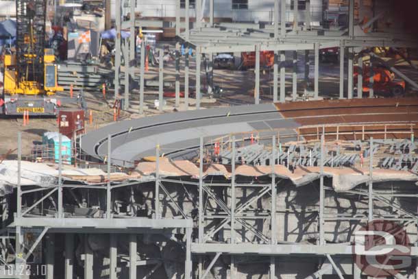 Looks like the rockwork on the other side is starting to be painted, notice the rust color at the top of the concrete in the foreground.