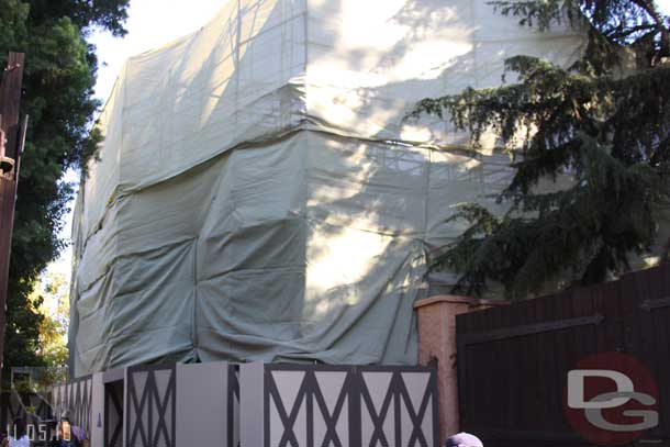 The restrooms are open in Fantasyland but the exterior is covered up for some painting.