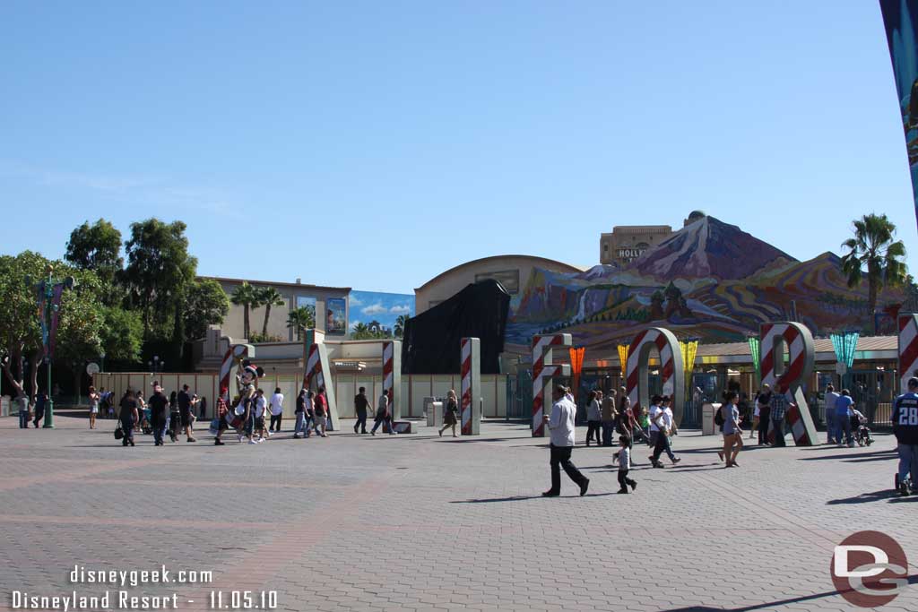 The West side tile mural (right as you are looking at the entrance) has been removed and they are now working on the East side.  Also the letters have their holiday makeover.