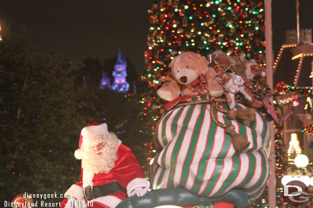 Almost got the shot, except Santa would not look up and I got that weird glow from the light I had to shoot over.. maybe next time.