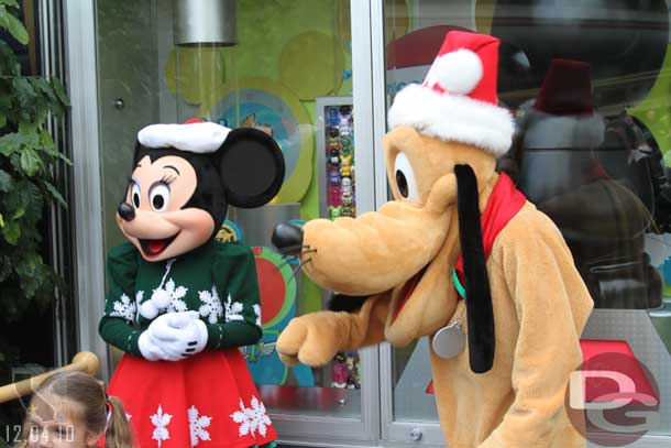 Minnie and Pluto hanging out in Tomorrowland.