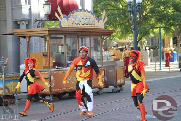 Show time.  The procession is lead by several performers from the Pixar Play Parade.