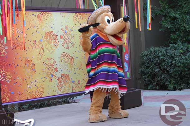 Pluto was dancing and having a good time.