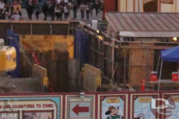 A closer look at a section of the previous shot shows they have put in some retaining walls as they work on the new entrance.  Guessing this is where the utility/data lines will be run.