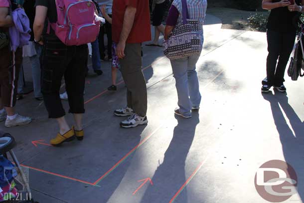 By the characters there was tape on the ground to form the queues.