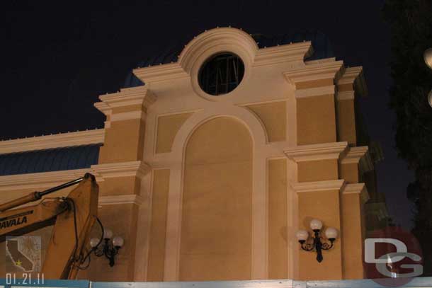 The Mermaid building at night.