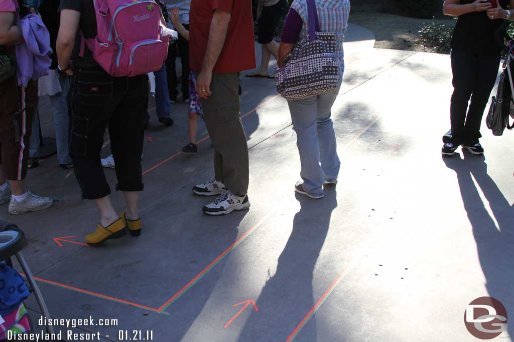 By the characters there was tape on the ground to form the queues.