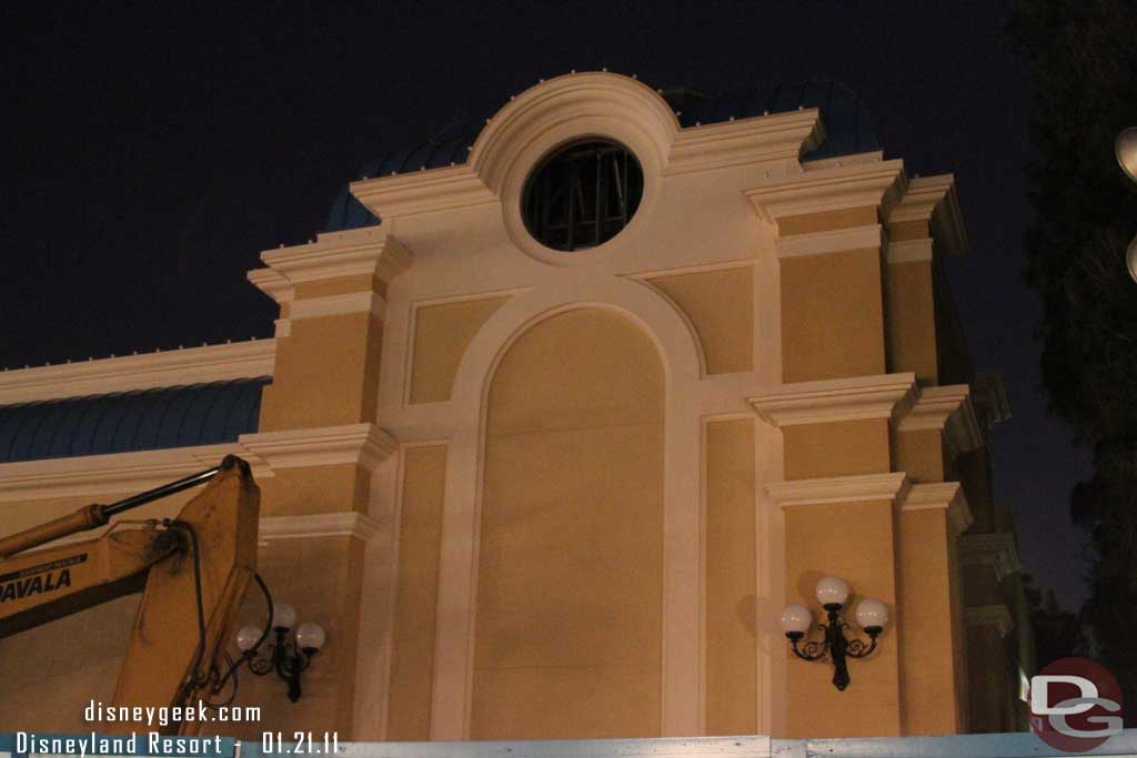 The Mermaid building at night.