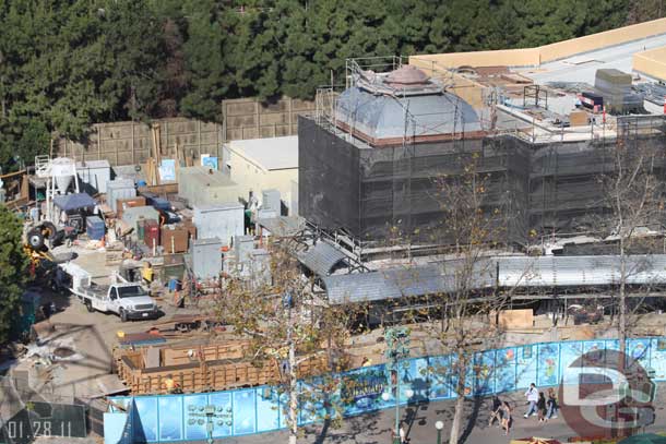 Pieces are being installed on the left tower of the Mermaid building.