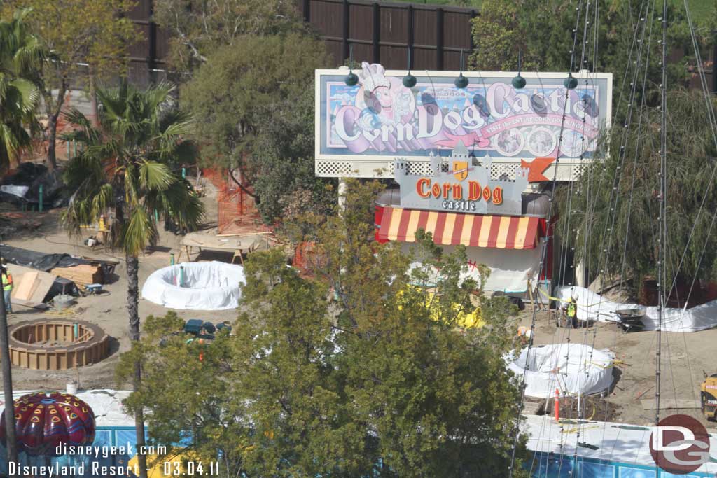 Looks like the concrete planters have been poured near the Corn Dog stand.