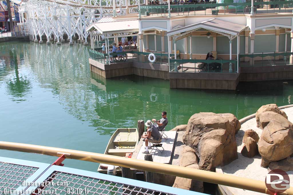 These two dropped off the divers to work on the World of Color platform then took up a spot to watch nearby.