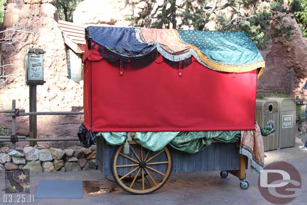 A merchandise cart near the entrance.