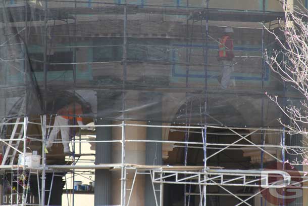 The columns have been darkened, also notice work on the left for the new attraction sign.