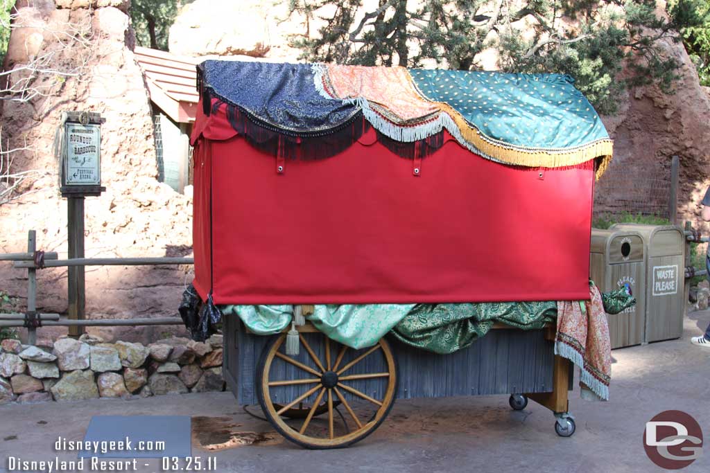 A merchandise cart near the entrance.