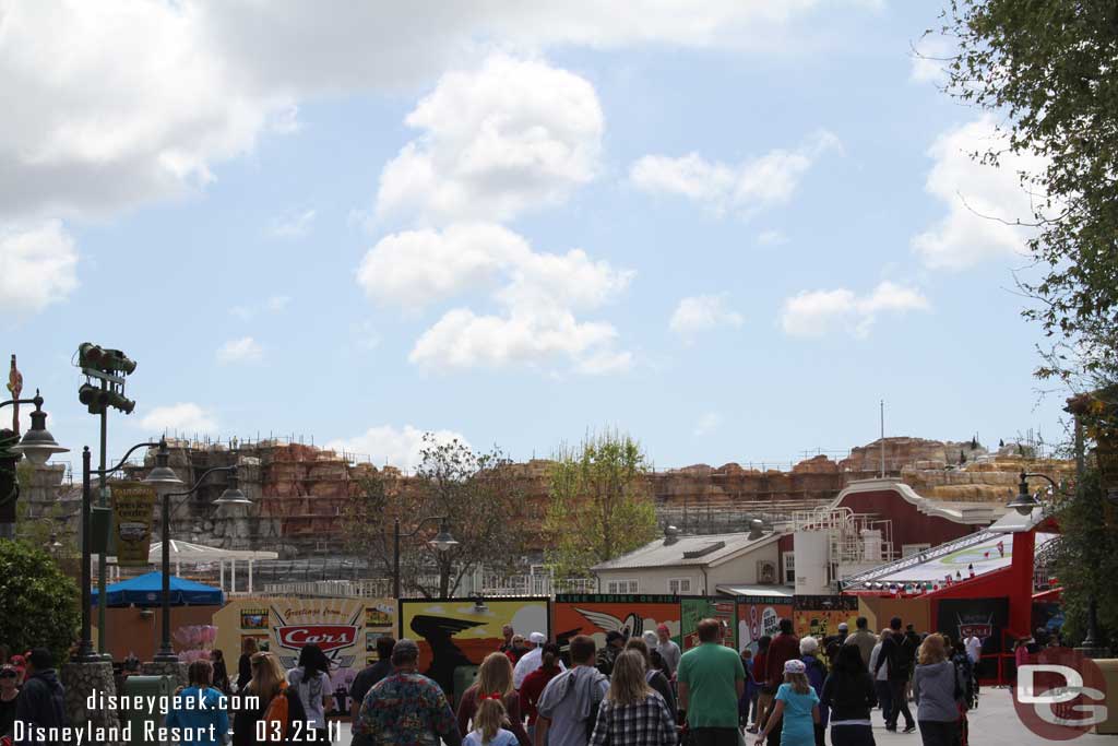 The Cars Land rock work is looking great and filling in the view.