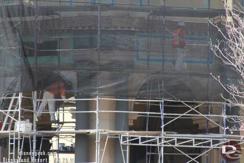 The columns have been darkened, also notice work on the left for the new attraction sign.