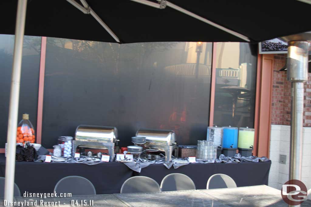 A buffet set up on the patio of the ESPN Zone