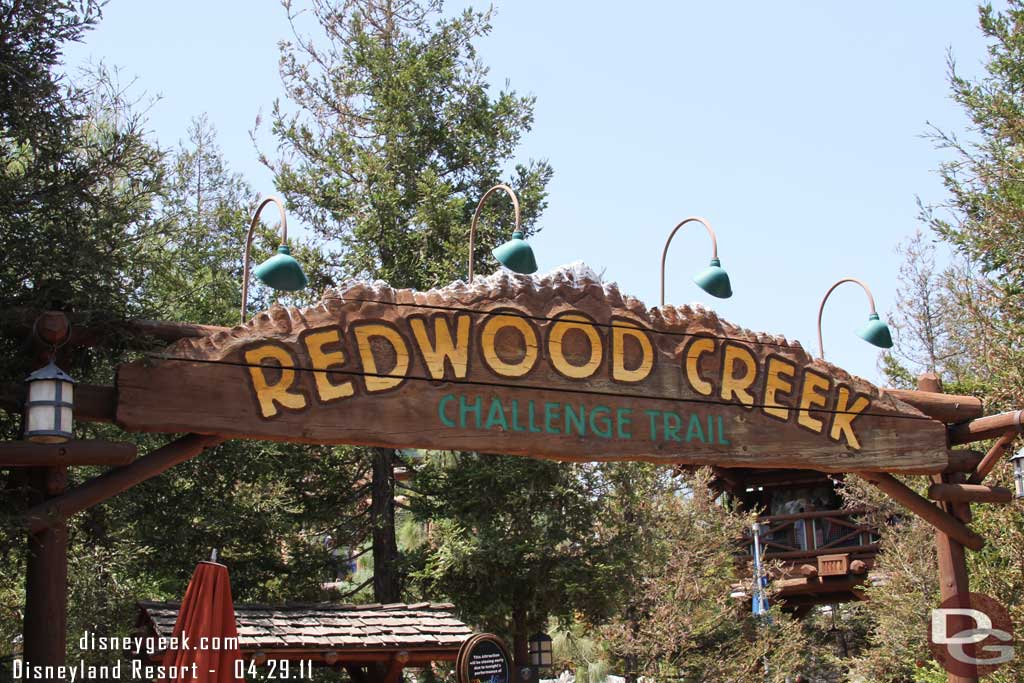 I read on a couple of sites that the Brother Bear overlay will slowly be removed from the Redwood Creek area.