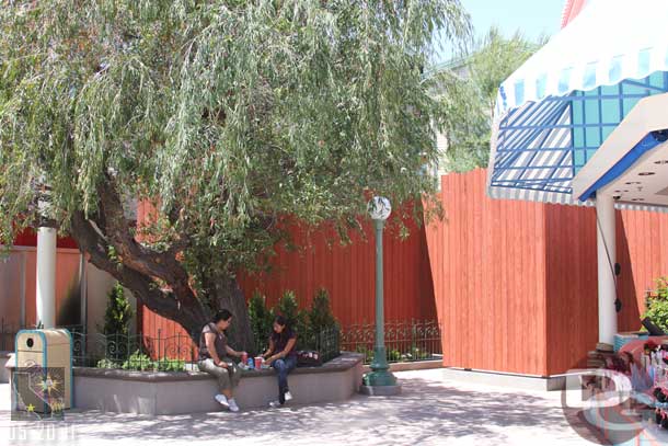 Another shaded area to eat in and the backstage gate/wall behind it.