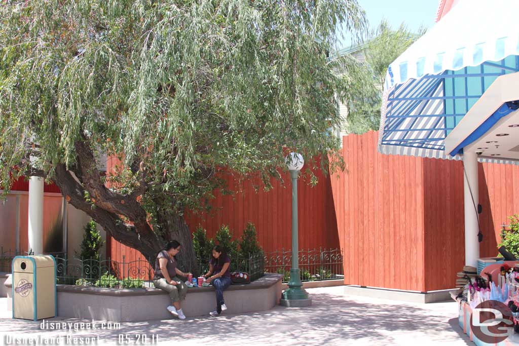 Another shaded area to eat in and the backstage gate/wall behind it.