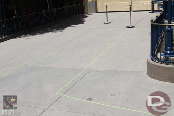 More of the extended queue.  Wonder if they are going to drill in poles, notice the markings on the ground.