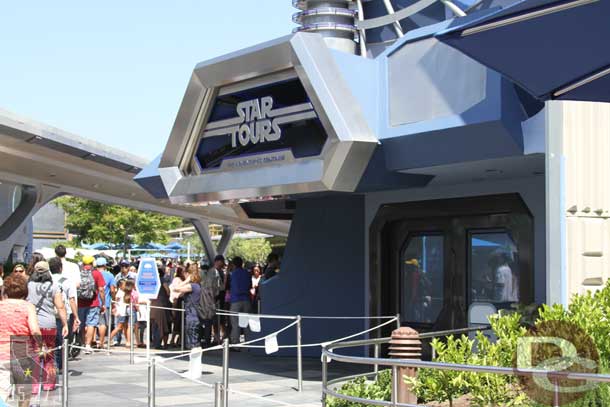 They had the queue for Star Tours stretching to Main Street but it was not needed.  The wait was 45 min and filled just the Tomorrowland area.