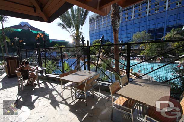 More seating outside, overlooking the pool.