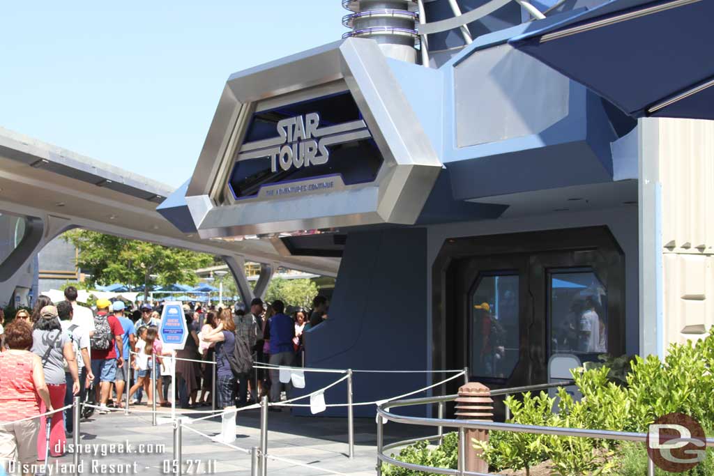 They had the queue for Star Tours stretching to Main Street but it was not needed.  The wait was 45 min and filled just the Tomorrowland area.