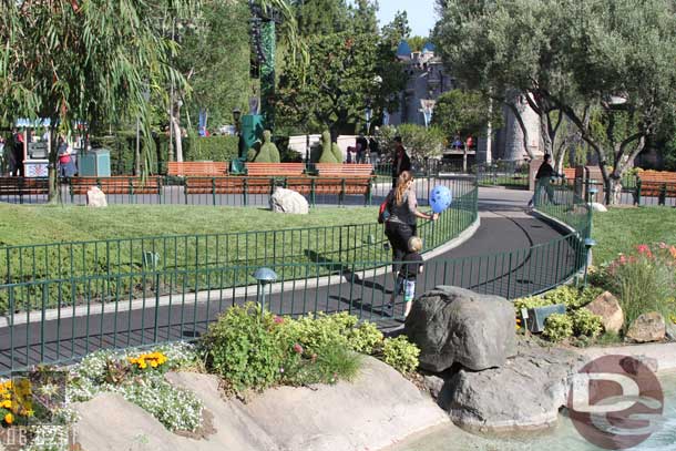 Looks like they recently repaved or resurfaced the walkway near the Pixie Hollow fountains.