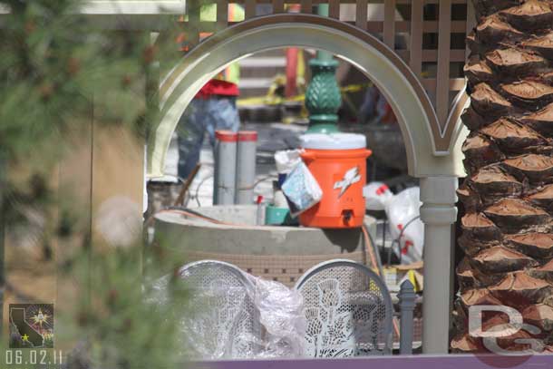 A closer look through one of the arches at the seating area beyond and the metal work on the gates.