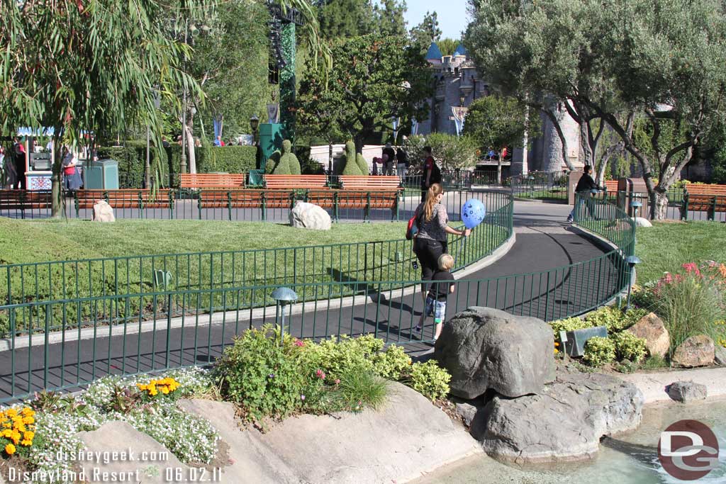 Looks like they recently repaved or resurfaced the walkway near the Pixie Hollow fountains.