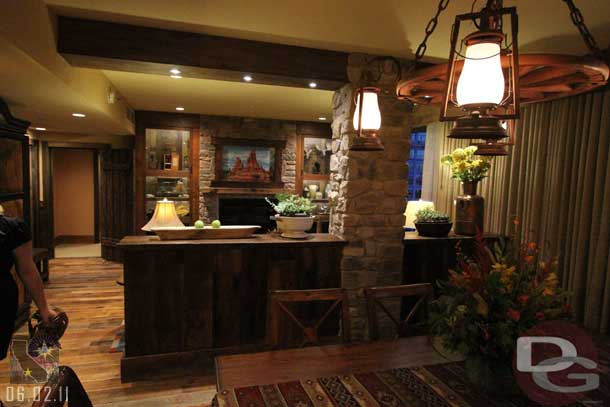 The dining room in the foreground and living room in the background.