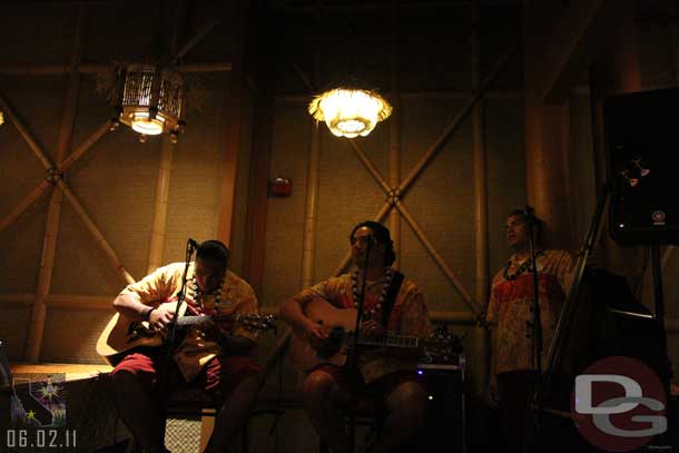 A group setting up to perform outside of Trader Sams