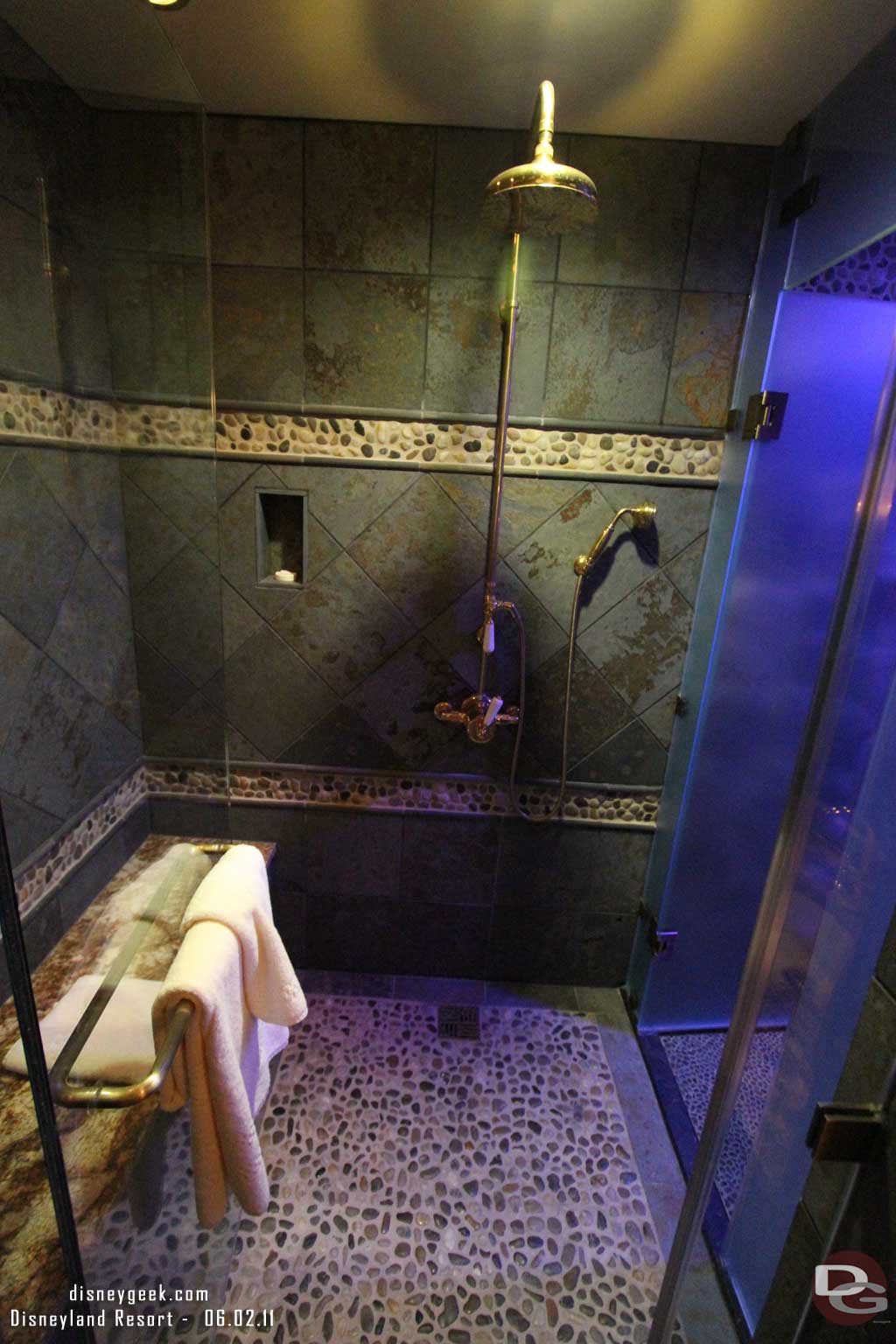 You can pass through the main shower into another grotto.