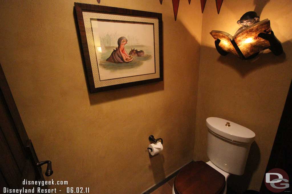 Notice the light fixture above the toilet.