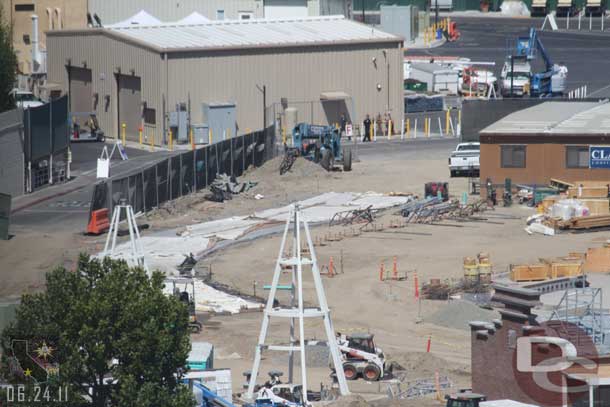 Looks to be a roadway/pathway/walkway going in.  Off to the right looks to be footers, probably for a wall along the walkway.