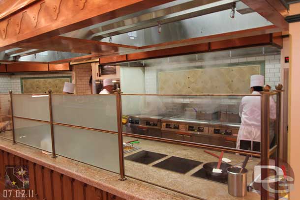 The kitchen areas are open so you can watch them prepare the dishes.