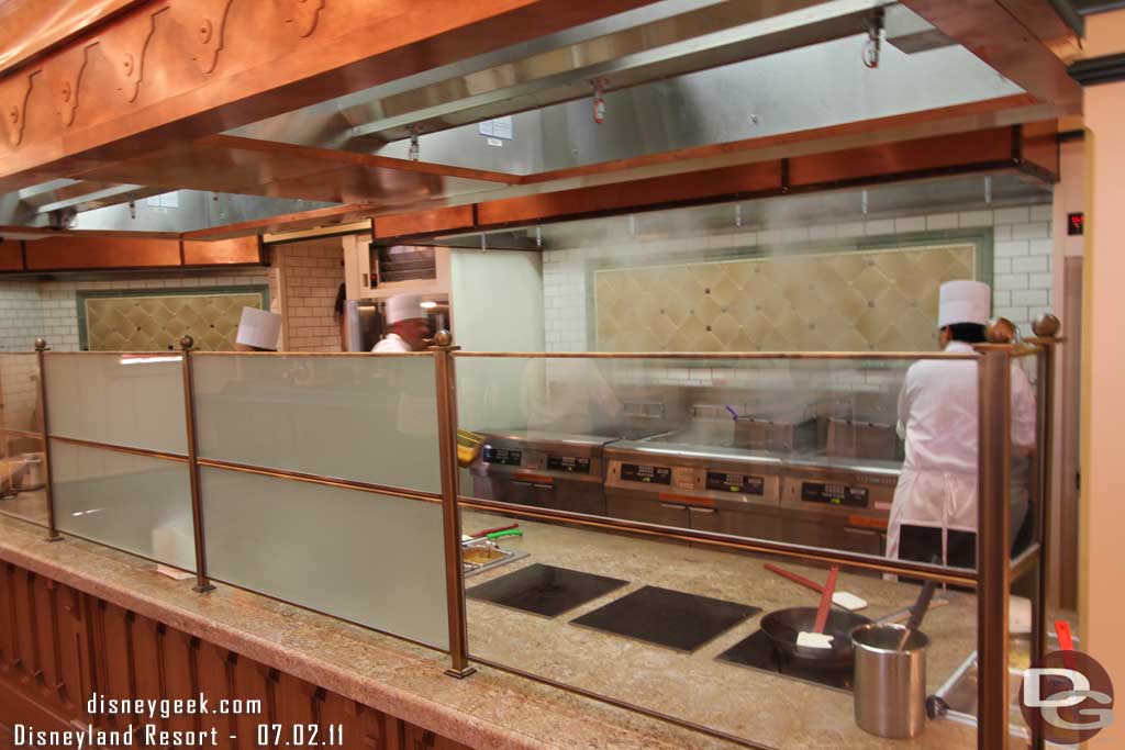 The kitchen areas are open so you can watch them prepare the dishes.