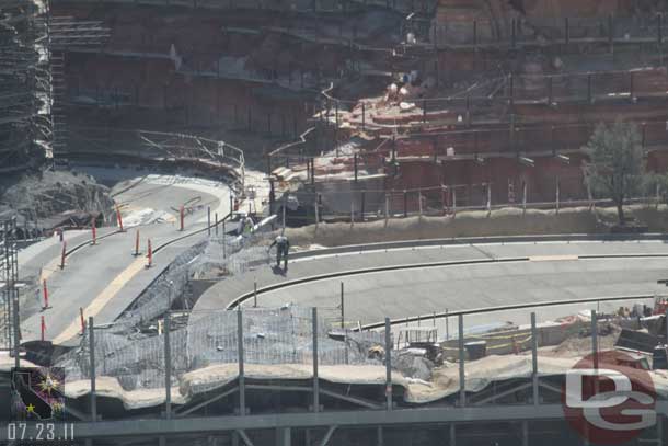 One worker checking out the rock work mesh along the track