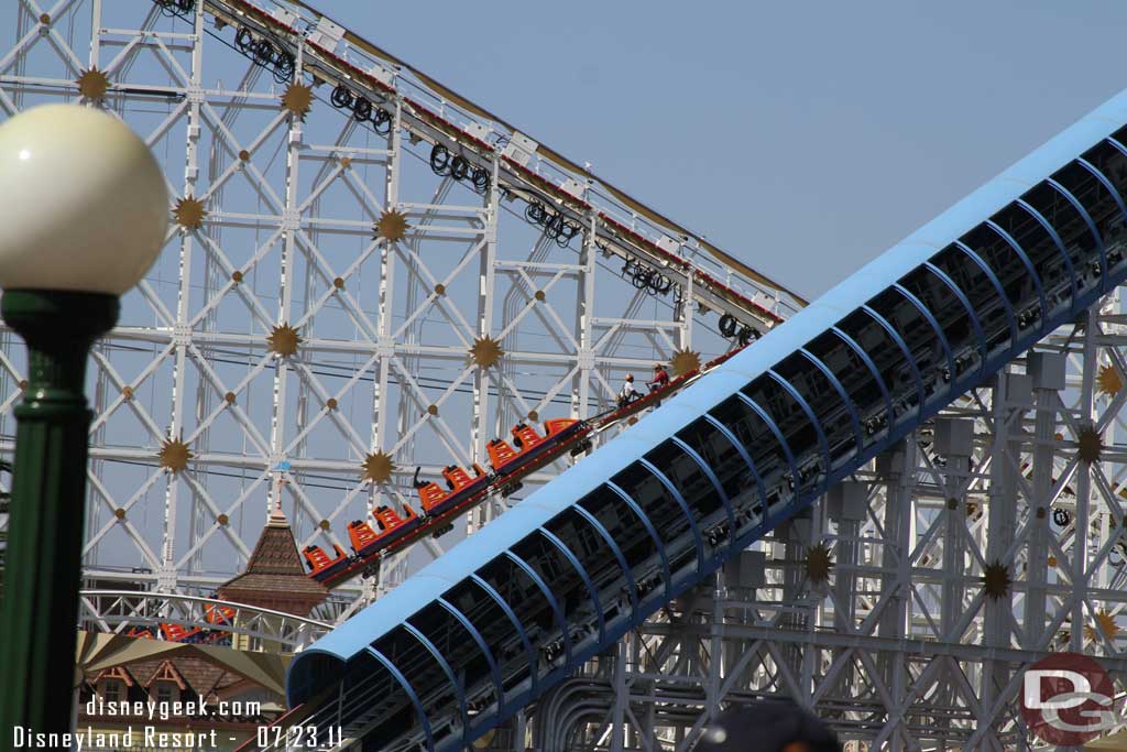 Friday evening there was an incident on Screamin where a backback fell out of a train and caused an emergency stop.  A train got stuck in the valley above Toy Story.  Today they were manually winching the train out of the valley.