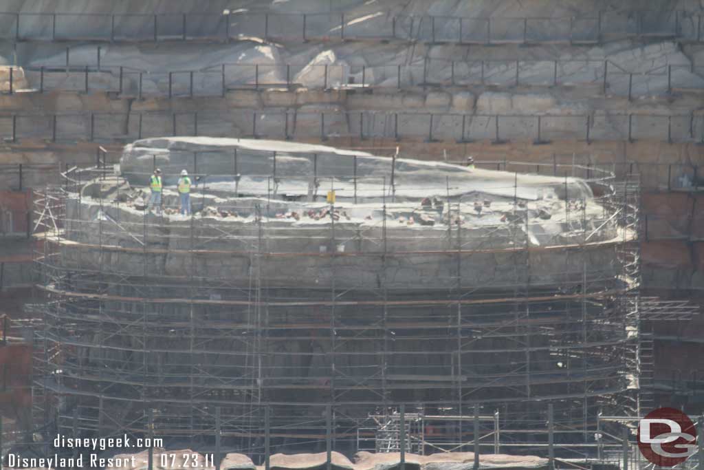 Details are starting to emerge on the center structure.  Notice the workers for scale.