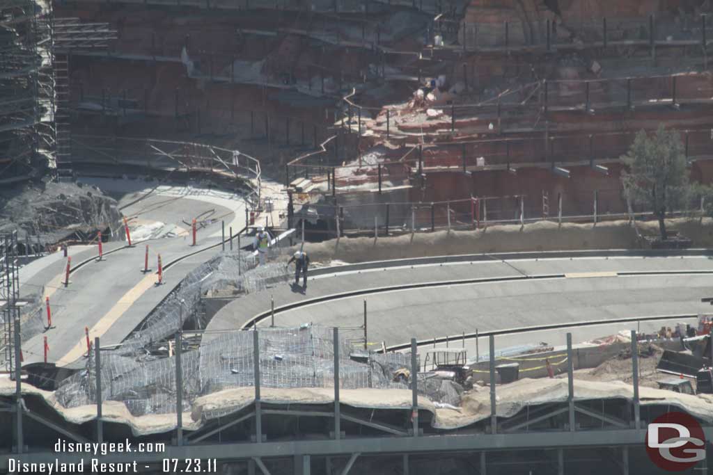 One worker checking out the rock work mesh along the track