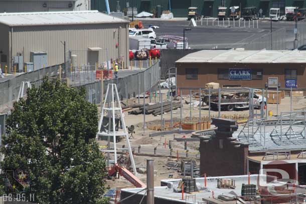 More curbs and foundations going in behind/next to the Flying Tires.  Also noticed all the poles in the back.  Guessing those are going to Maters since they have some in already.  Lastly the fence is not pushed out and along the new road/walkway that went in.